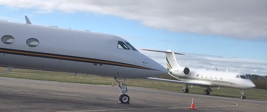 Two private jets parked at the Hazleton Airport